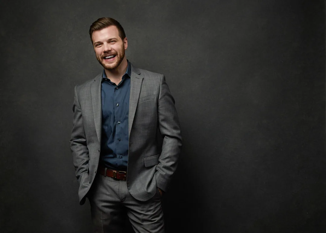 A polished professional studio headshot by JA Headshots